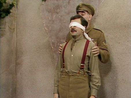 Blackadder wearing a blindfold