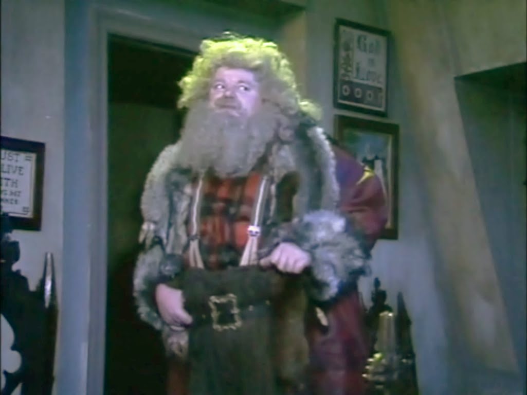 Robbie Coltrane as the Ghost of Christmas in Blackadder