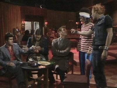 Vyv from the Young Ones introducing his mum to the guys